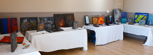 marie gelinas giles abstract acrylic paintings with CAC on tables