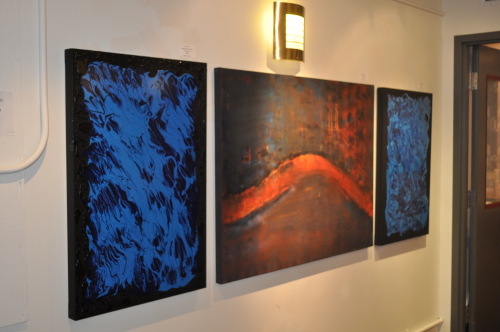Three paintings to left